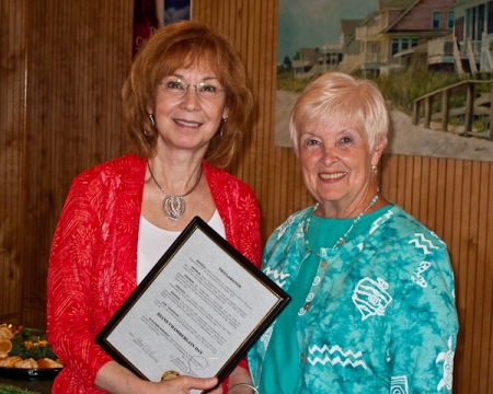 Diane receives certificate proclaiming May 16 Diane Chamberlain Day in Surf City, NC.